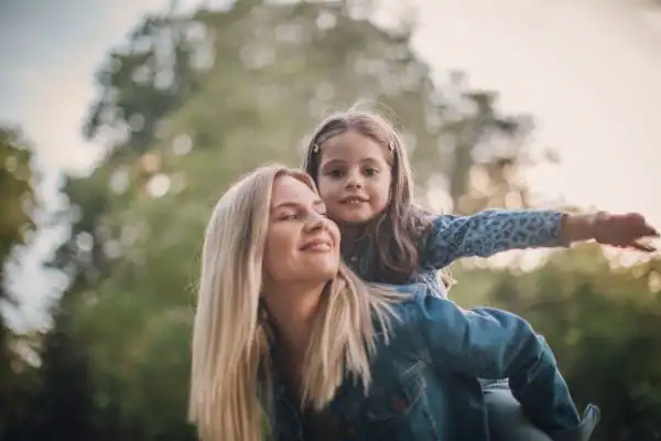 happy mum and daughter following mediation to resolve parental alienation Bury